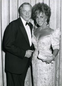 Elizabeth Taylor, Franco Zeffirelli  1987 NY cliff.jpg